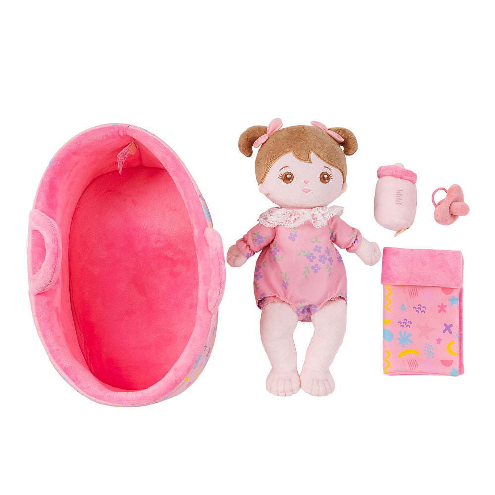 Muñeca de bebé niña de felpa con posición sentada rosa personalizada